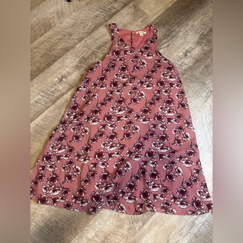 Miami size XS mini dress, sleeveless w button back  detail